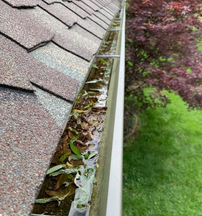 Gutter Cleanouts Can Improve Downspout Flows